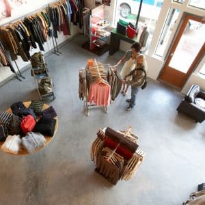 Chic concrete flooring in a Chicagoland clothing boutique, adding a modern touch.