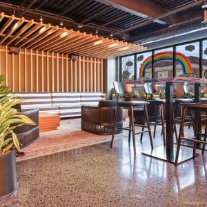 Sleek grind and seal concrete floor in a bustling restaurant.
