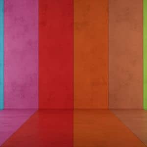 Rainbow colors painted on a smooth concrete surface.